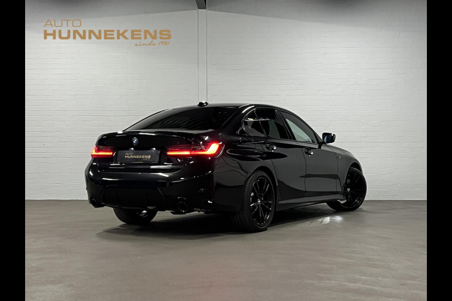 BMW 3-serie 330e M Sport | Open dak | Adapt. cruise | Trekhaak | Head-up | Stoelverwarming | Sfeerverlichting | Carplay | Leder