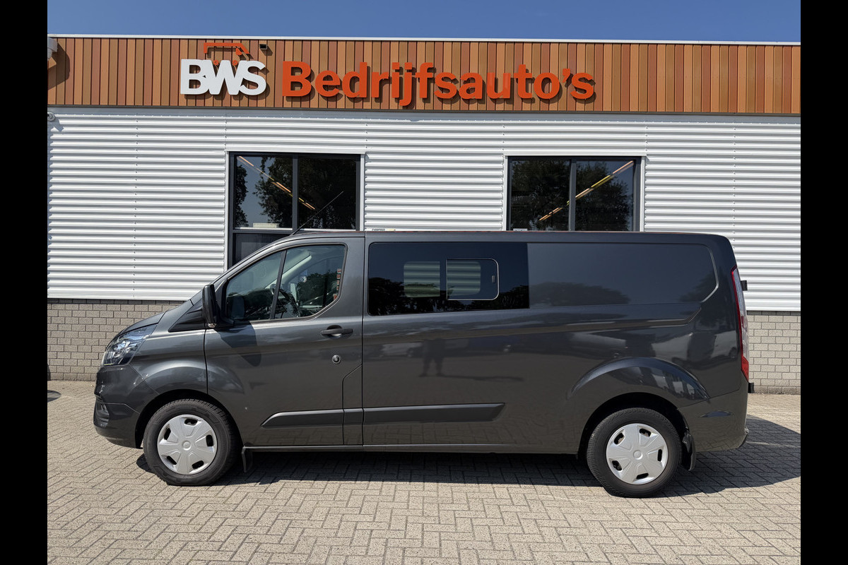 Ford Transit Custom 320 2.0 TDCI automaat L2H1 Trend / 3 persoons / vaste prijs rijklaar € 17.950 ex btw / lease vanaf € 302 / trekhaak / laadruimte gestoffeerd / airco / cruise / magneic grey metallic