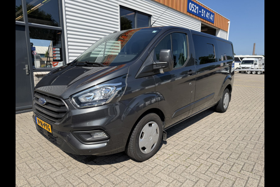 Ford Transit Custom 320 2.0 TDCI automaat L2H1 Trend / 3 persoons / vaste prijs rijklaar € 17.950 ex btw / lease vanaf € 302 / trekhaak / laadruimte gestoffeerd / airco / cruise / magneic grey metallic