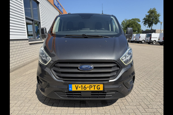 Ford Transit Custom 320 2.0 TDCI automaat L2H1 Trend / 3 persoons / vaste prijs rijklaar € 17.950 ex btw / lease vanaf € 302 / trekhaak / laadruimte gestoffeerd / airco / cruise / magneic grey metallic