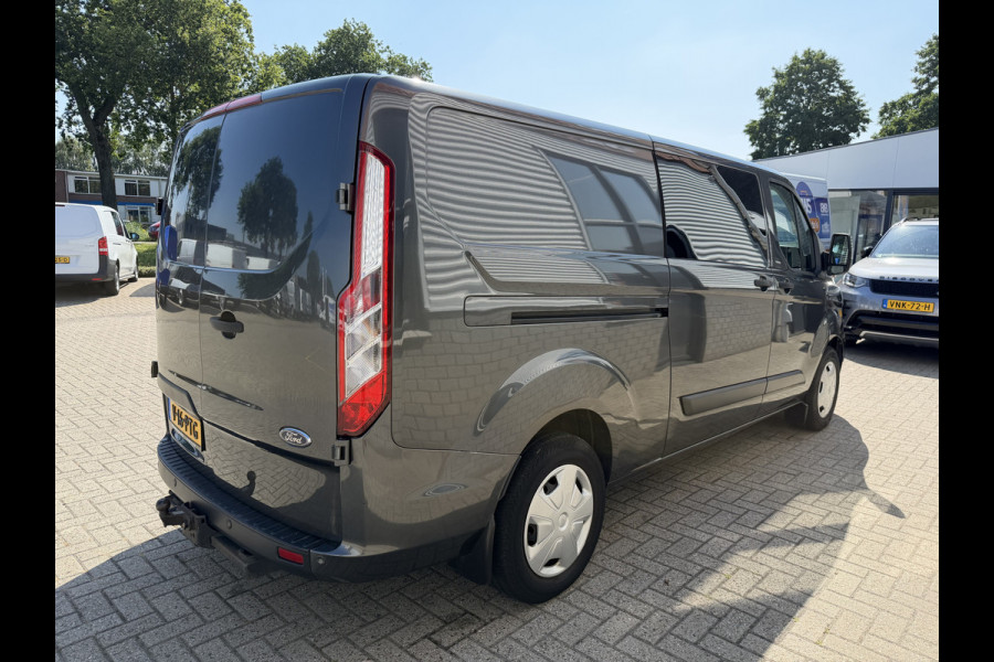 Ford Transit Custom 320 2.0 TDCI automaat L2H1 Trend / 3 persoons / vaste prijs rijklaar € 17.950 ex btw / lease vanaf € 302 / trekhaak / laadruimte gestoffeerd / airco / cruise / magneic grey metallic