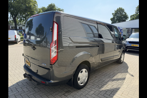 Ford Transit Custom 320 2.0 TDCI automaat L2H1 Trend / 3 persoons / vaste prijs rijklaar € 17.950 ex btw / lease vanaf € 302 / trekhaak / laadruimte gestoffeerd / airco / cruise / magneic grey metallic