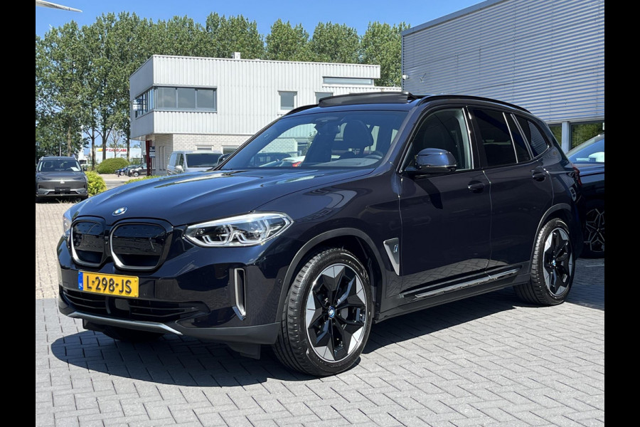 BMW iX3 High Executive 80 kWh | SOH 97,4% | Leder | Pano | Trekhaak | Harman Kardon | 360 Camera | Stoelverwarming | Adaptive Cruise