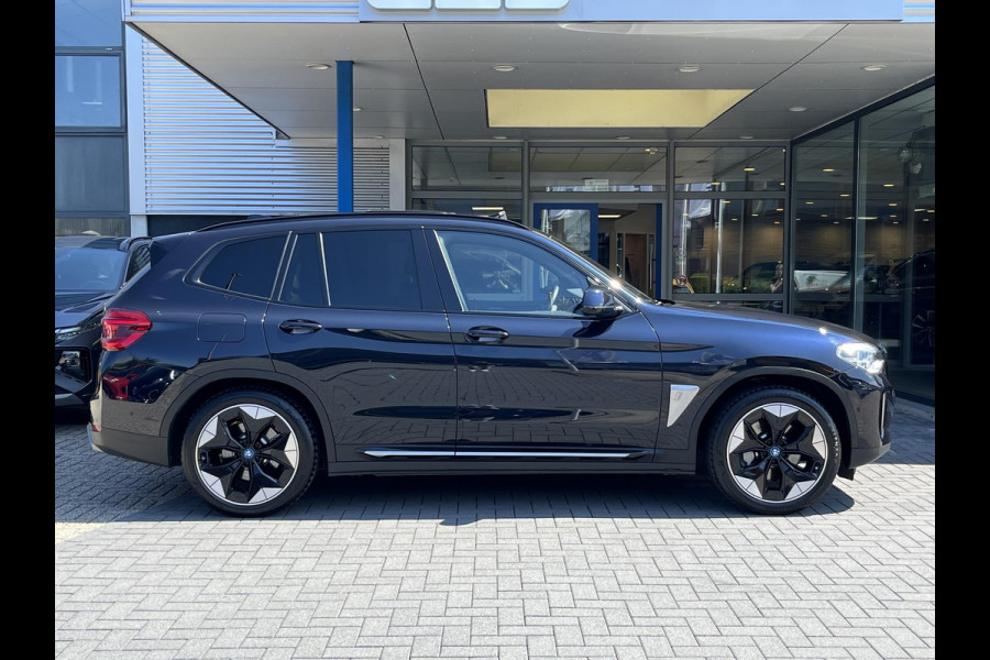 BMW iX3 High Executive 80 kWh | SOH 97,4% | Leder | Pano | Trekhaak | Harman Kardon | 360 Camera | Stoelverwarming | Adaptive Cruise