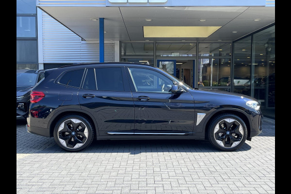 BMW iX3 High Executive 80 kWh | SOH 97,4% | Leder | Pano | Trekhaak | Harman Kardon | 360 Camera | Stoelverwarming | Adaptive Cruise