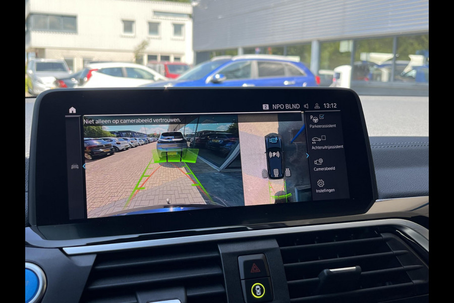 BMW iX3 High Executive 80 kWh | SOH 97,4% | Leder | Pano | Trekhaak | Harman Kardon | 360 Camera | Stoelverwarming | Adaptive Cruise