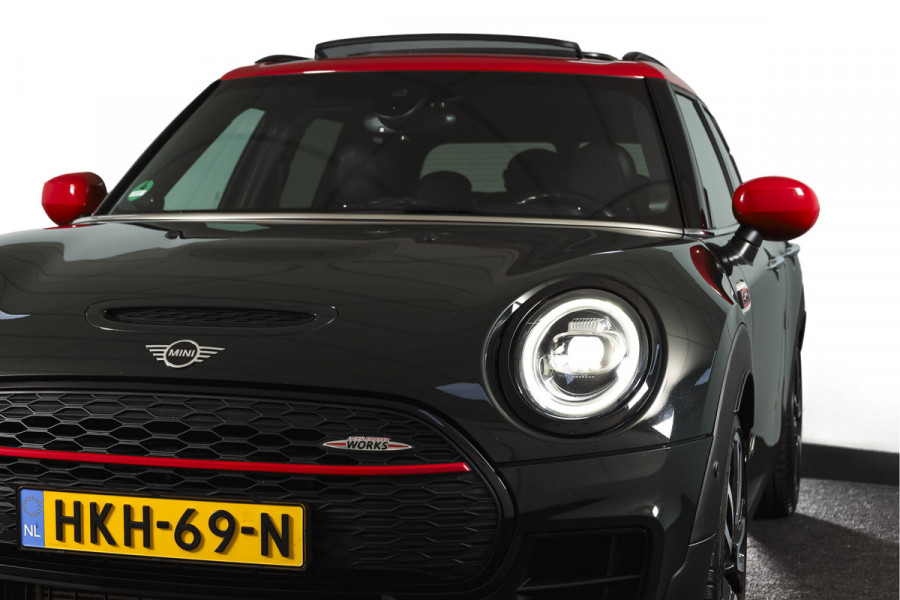 MINI Clubman 2.0 JCW ALL4 Chili | S/K-Panodak | Adapt. Cruise | Stoelverw. | PDC | Camera | NAV + App.Connect | ECC | Harman Kardon | LM 19" |