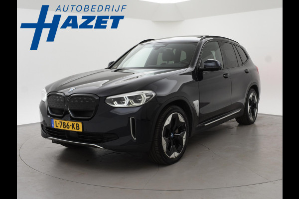BMW iX3 HIGH EXECUTIVE 80 kWh + TREKHAAK | PANORAMA | 360 CAMERA | ADAPTIVE CRUISE | SFEERVERLICHTING