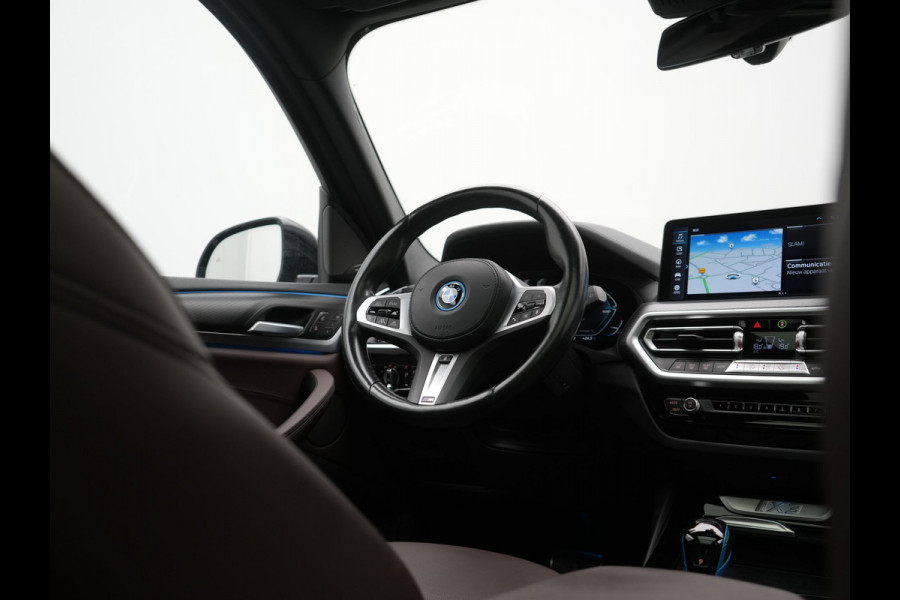 BMW iX3 M Sport High Executive 80 kWh 286pk Dealer O.H | Trekhaak Af Fabriek | Panodak | Laser LED | Head Up | Adaptive Cruise | 360 Camera | Lederen Sportstoelen Memory & Verwarmd | Harman / Kardon | Pilot Assist | Keyless | Blis | Apple Carplay | Navigatie | Virtual | DAB |