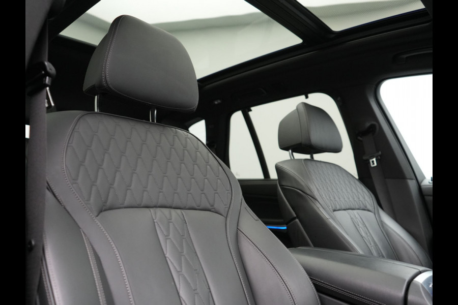 BMW X5 xDrive50e High Executive PHEV 490pk Dealer O.H. | Panodak Sky Lounge | M Sport | Luchtvering | Head Up | 360 Camera | Harman / Kardon | Nappa Lederen Comfortstoelen Memory & Verwarmd | Carbon Schwarz | Apple Carplay | Keyless | Blis | 22"L Plug In Hybrid |