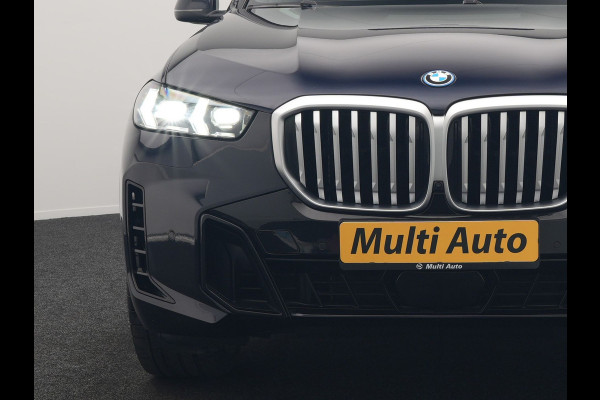 BMW X5 xDrive50e High Executive PHEV 490pk Dealer O.H. | Panodak Sky Lounge | M Sport | Luchtvering | Head Up | 360 Camera | Harman / Kardon | Nappa Lederen Comfortstoelen Memory & Verwarmd | Carbon Schwarz | Apple Carplay | Keyless | Blis | 22"L Plug In Hybrid |