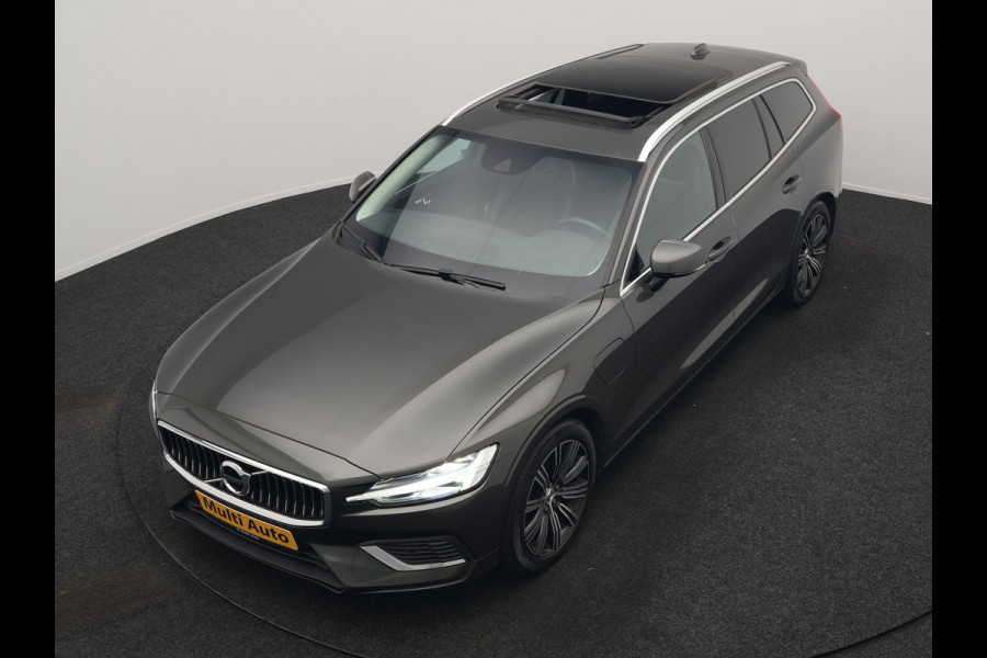 Volvo V60 T6 Recharge AWD Inscription PHEV 340pk | Panodak | Adaptive Cruise | Elektrische achterklep | Camera | Stoelen & Stuur Verwarmd | Keyless | Blis | Apple Carplay | Navigatie | DAB | Virtual | 18"L.M | Plug In Hybrid |