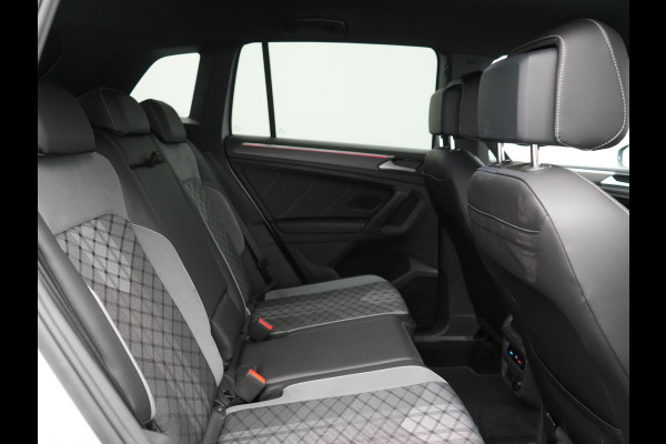 Volkswagen Tiguan 1.4 TSI eHybrid R-Line PHEV 245pk Dealer O.H | Trekhaak Af Fabriek | Adaptive Cruise | IQ Light | Adaptive Onderstel | Camera | Alcantara Sportstoelen & Stuur Verwarmd | Blis | Keyless | Sfeerverlichting | Virtual | Navigatie | DAB | 20"L.M | Plug In Hybrid |