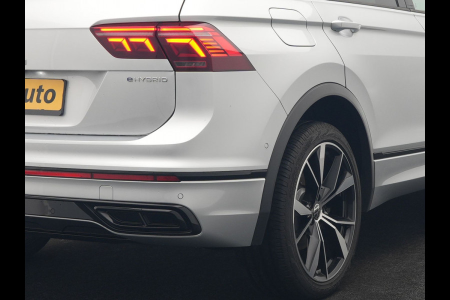 Volkswagen Tiguan 1.4 TSI eHybrid R-Line PHEV 245pk Dealer O.H | Trekhaak Af Fabriek | Adaptive Cruise | IQ Light | Adaptive Onderstel | Camera | Alcantara Sportstoelen & Stuur Verwarmd | Blis | Keyless | Sfeerverlichting | Virtual | Navigatie | DAB | 20"L.M | Plug In Hybrid |