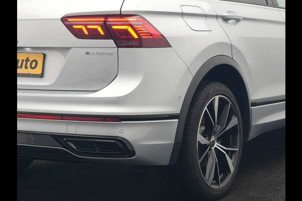 Volkswagen Tiguan 1.4 TSI eHybrid R-Line PHEV 245pk Dealer O.H | Trekhaak Af Fabriek | Adaptive Cruise | IQ Light | Adaptive Onderstel | Camera | Alcantara Sportstoelen & Stuur Verwarmd | Blis | Keyless | Sfeerverlichting | Virtual | Navigatie | DAB | 20"L.M | Plug In Hybrid |