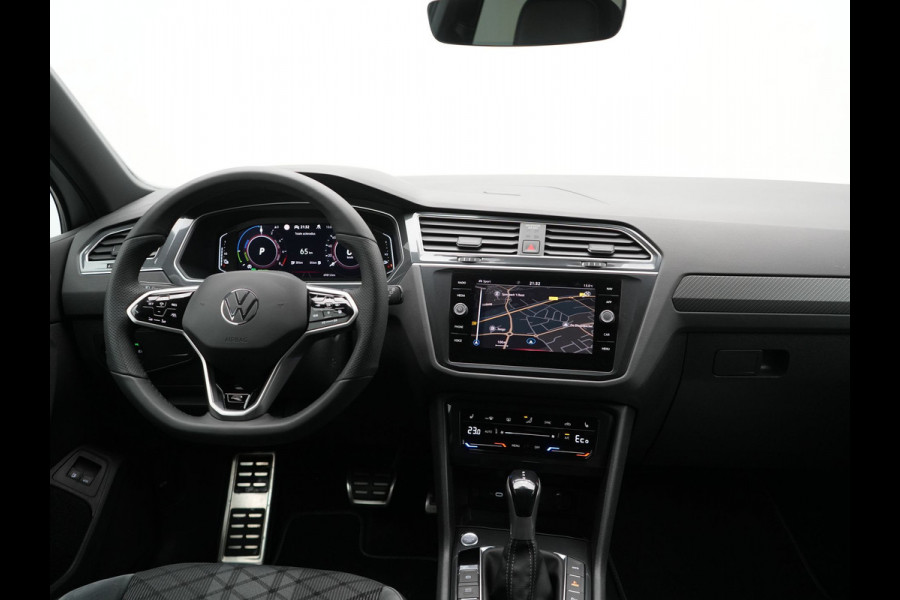 Volkswagen Tiguan 1.4 TSI eHybrid R-Line PHEV 245pk Dealer O.H | Trekhaak Af Fabriek | Adaptive Cruise | IQ Light | Adaptive Onderstel | Camera | Alcantara Sportstoelen & Stuur Verwarmd | Blis | Keyless | Sfeerverlichting | Virtual | Navigatie | DAB | 20"L.M | Plug In Hybrid |
