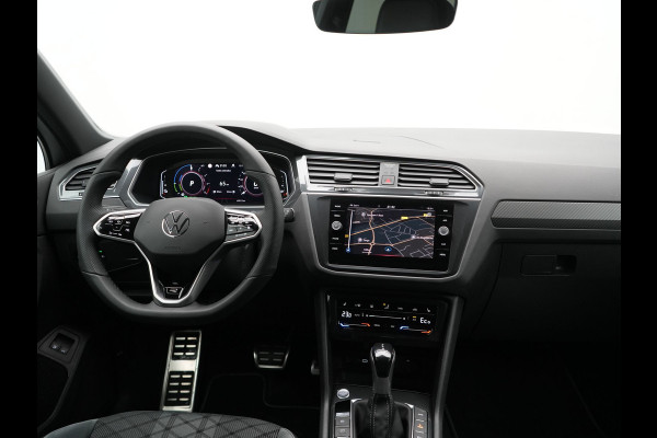 Volkswagen Tiguan 1.4 TSI eHybrid R-Line PHEV 245pk Dealer O.H | Trekhaak Af Fabriek | Adaptive Cruise | IQ Light | Adaptive Onderstel | Camera | Alcantara Sportstoelen & Stuur Verwarmd | Blis | Keyless | Sfeerverlichting | Virtual | Navigatie | DAB | 20"L.M | Plug In Hybrid |