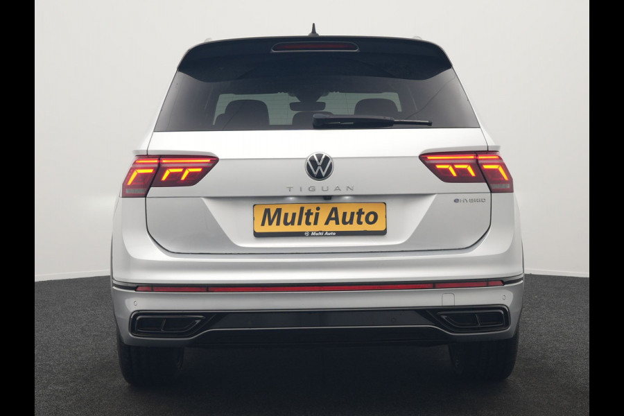 Volkswagen Tiguan 1.4 TSI eHybrid R-Line PHEV 245pk Dealer O.H | Trekhaak Af Fabriek | Adaptive Cruise | IQ Light | Adaptive Onderstel | Camera | Alcantara Sportstoelen & Stuur Verwarmd | Blis | Keyless | Sfeerverlichting | Virtual | Navigatie | DAB | 20"L.M | Plug In Hybrid |
