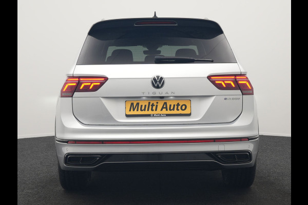 Volkswagen Tiguan 1.4 TSI eHybrid R-Line PHEV 245pk Dealer O.H | Trekhaak Af Fabriek | Adaptive Cruise | IQ Light | Adaptive Onderstel | Camera | Alcantara Sportstoelen & Stuur Verwarmd | Blis | Keyless | Sfeerverlichting | Virtual | Navigatie | DAB | 20"L.M | Plug In Hybrid |