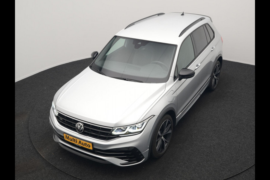 Volkswagen Tiguan 1.4 TSI eHybrid R-Line PHEV 245pk Dealer O.H | Trekhaak Af Fabriek | Adaptive Cruise | IQ Light | Adaptive Onderstel | Camera | Alcantara Sportstoelen & Stuur Verwarmd | Blis | Keyless | Sfeerverlichting | Virtual | Navigatie | DAB | 20"L.M | Plug In Hybrid |