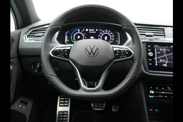 Volkswagen Tiguan 1.4 TSI eHybrid R-Line PHEV 245pk Dealer O.H | Trekhaak Af Fabriek | Adaptive Cruise | IQ Light | Adaptive Onderstel | Camera | Alcantara Sportstoelen & Stuur Verwarmd | Blis | Keyless | Sfeerverlichting | Virtual | Navigatie | DAB | 20"L.M | Plug In Hybrid |