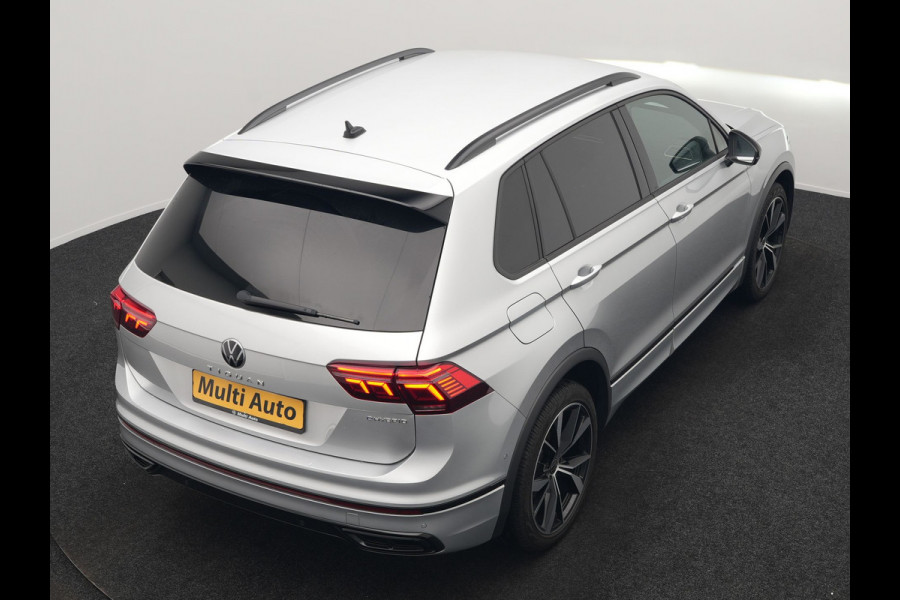 Volkswagen Tiguan 1.4 TSI eHybrid R-Line PHEV 245pk Dealer O.H | Trekhaak Af Fabriek | Adaptive Cruise | IQ Light | Adaptive Onderstel | Camera | Alcantara Sportstoelen & Stuur Verwarmd | Blis | Keyless | Sfeerverlichting | Virtual | Navigatie | DAB | 20"L.M | Plug In Hybrid |