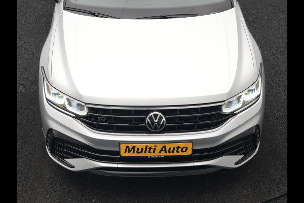 Volkswagen Tiguan 1.4 TSI eHybrid R-Line PHEV 245pk Dealer O.H | Trekhaak Af Fabriek | Adaptive Cruise | IQ Light | Adaptive Onderstel | Camera | Alcantara Sportstoelen & Stuur Verwarmd | Blis | Keyless | Sfeerverlichting | Virtual | Navigatie | DAB | 20"L.M | Plug In Hybrid |