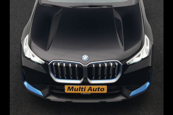 BMW iX1 xDrive30 67 kWh 313pk Dealer O.H. | Adaptief M Onderstel | Camera | Cruise Control | Stoelverwarming | Widescreen Navi | Park Assist | Apple Carplay | Navigatie | DAB | Standkachel |