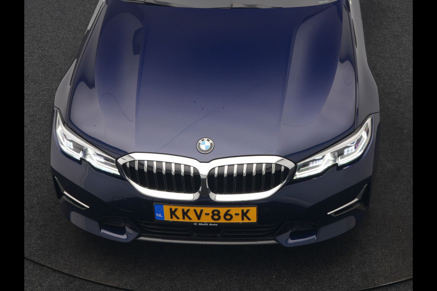 BMW 3 Serie Touring 330e Luxury Line PHEV 293pk Dealer O.H. | Trekhaak Af Fabriek | Panodak | Head Up | Adaptive Cruise | Laser LED | Camera | Lederen Comfortstoelen Verwarmd | Sfeerverlichting | Keyless | Blis | Apple Carplay | Navigatie | DAB | Plug In Hybrid |