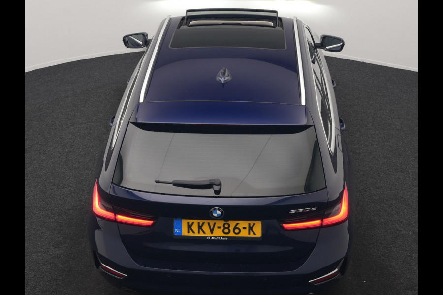 BMW 3 Serie Touring 330e Luxury Line PHEV 293pk Dealer O.H. | Trekhaak Af Fabriek | Panodak | Head Up | Adaptive Cruise | Laser LED | Camera | Lederen Comfortstoelen Verwarmd | Sfeerverlichting | Keyless | Blis | Apple Carplay | Navigatie | DAB | Plug In Hybrid |