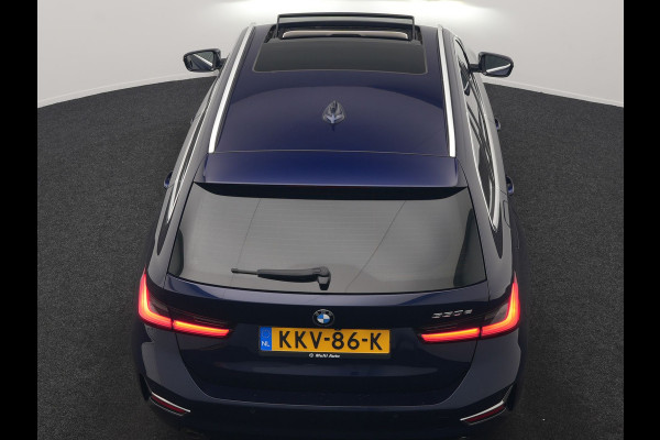 BMW 3 Serie Touring 330e Luxury Line PHEV 293pk Dealer O.H. | Trekhaak Af Fabriek | Panodak | Head Up | Adaptive Cruise | Laser LED | Camera | Lederen Comfortstoelen Verwarmd | Sfeerverlichting | Keyless | Blis | Apple Carplay | Navigatie | DAB | Plug In Hybrid |