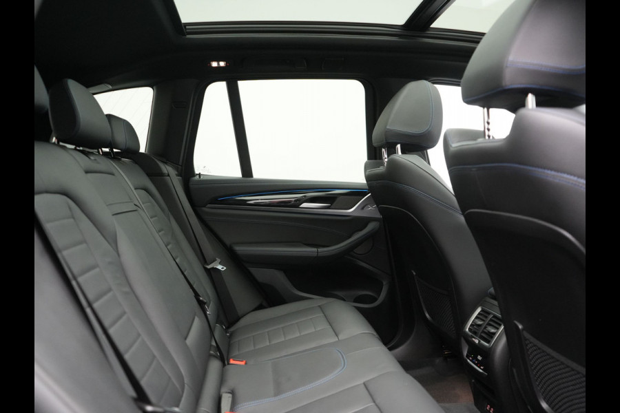 BMW iX3 M Sport High Executive 80 kWh 286pk SOH 95.2% Dealer O.H. | Panodak | Adaptive Cruise | Head Up | 360 Camera | Harman / Kardon | Lederen Sportstoelen Memory & Verwarmd | Keyless | Blis | Stuur Verwarmd | Sfeerverlichting | Apple Carplay | 20"L.M |