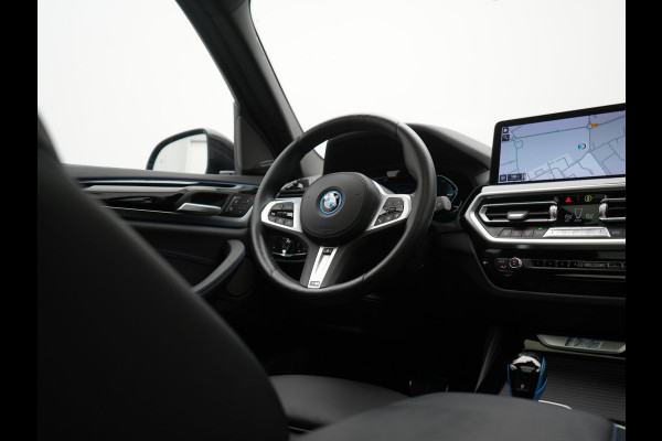 BMW iX3 M Sport High Executive 80 kWh 286pk SOH 95.2% Dealer O.H. | Panodak | Adaptive Cruise | Head Up | 360 Camera | Harman / Kardon | Lederen Sportstoelen Memory & Verwarmd | Keyless | Blis | Stuur Verwarmd | Sfeerverlichting | Apple Carplay | 20"L.M |