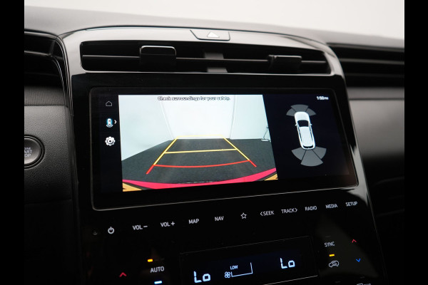 Hyundai Tucson 1.6 T-GDI N Line 4WD PHEV 265pk Dealer O.H. | Adaptive Cruise | Camera | Alcantara Sportstoelen & Stuur Verwarmd | Krell Audio | Apple Carplay | Keyless | Blis | 19"L.M | Navigatie | DAB | Plug In Hybrid |