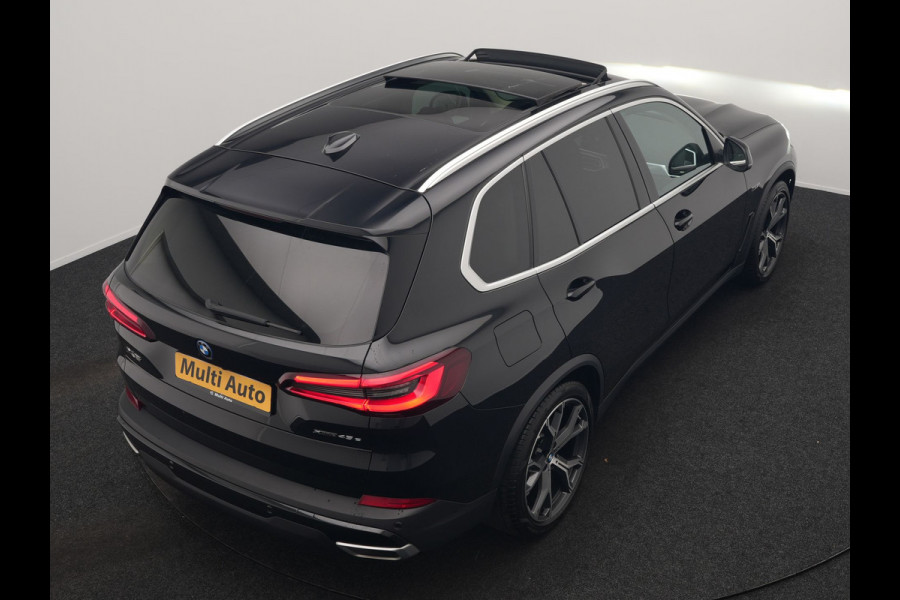 BMW X5 xDrive45e High Executive PHEV 395pk Dealer O.H. | Panodak | Luchtvering | 360 Camera | Adaptief Onderstel | Lederen Sportstoelen Memory & Verwarmd | Sfeerverlichting | Apple Carplay | Navigatie | DAB | Plug In Hybrid |
