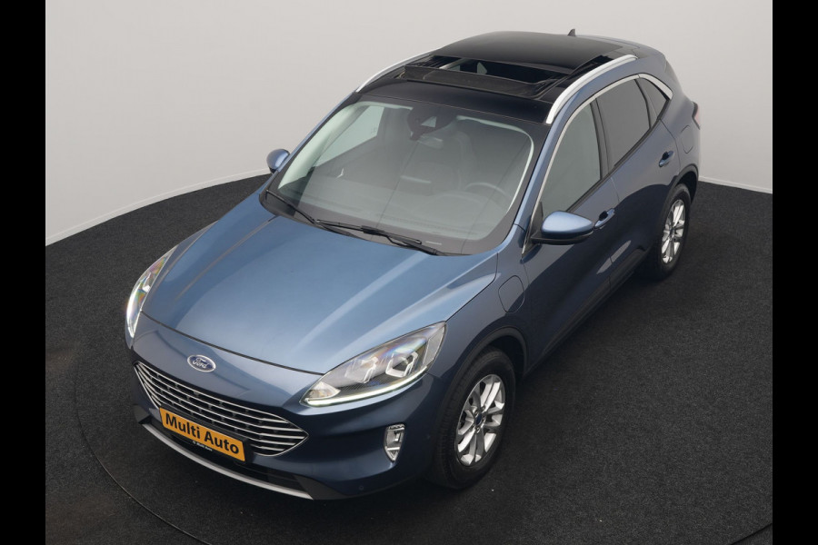 Ford Kuga 2.5 Titanium PHEV 225pk Dealer O.H. | Trekhaak Af Fabriek | Panodak | Adaptive Cruise | 360 Camera | Sportstoelen & Stuur Verwarmd | Keyless | Blis | Apple Carplay | Navigatie | DAB | Plug In Hybrid |
