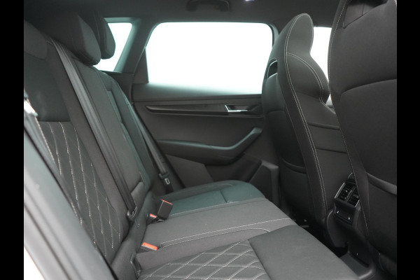 Škoda Karoq 1.5 TSI ACT Sportline DSG 150pk Dealer O.H | Panodak | Adaptive Cruise | Camera | RS Sportstoelen Verwarmd | Blis | Keyless | Apple Carplay | Black Optic | Virtual | Navigatie | DAB | 18"L.M |