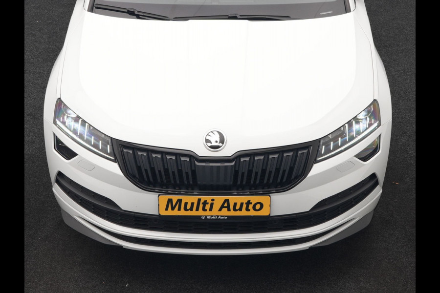 Škoda Karoq 1.5 TSI ACT Sportline DSG 150pk Dealer O.H | Panodak | Adaptive Cruise | Camera | RS Sportstoelen Verwarmd | Blis | Keyless | Apple Carplay | Black Optic | Virtual | Navigatie | DAB | 18"L.M |