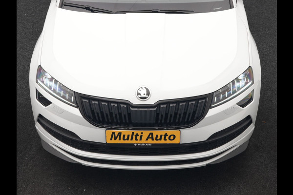 Škoda Karoq 1.5 TSI ACT Sportline DSG 150pk Dealer O.H | Panodak | Adaptive Cruise | Camera | RS Sportstoelen Verwarmd | Blis | Keyless | Apple Carplay | Black Optic | Virtual | Navigatie | DAB | 18"L.M |