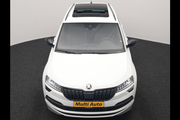Škoda Karoq 1.5 TSI ACT Sportline DSG 150pk Dealer O.H | Panodak | Adaptive Cruise | Camera | RS Sportstoelen Verwarmd | Blis | Keyless | Apple Carplay | Black Optic | Virtual | Navigatie | DAB | 18"L.M |