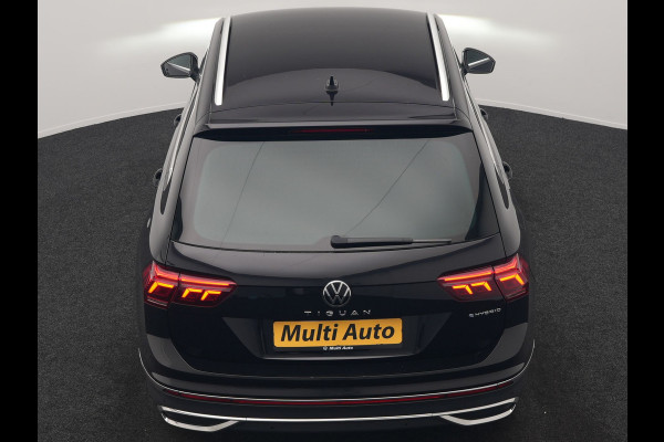 Volkswagen Tiguan 1.4 TSI eHybrid Elegance PHEV SOH 96.9% 245pk Dealer O.H | Adaptive Cruise | 360 Camera | Head Up | Stoelverwarming | IQ Light | Stuurverwarming | Apple Carplay | Travel Assist | Navigatie | Virtual | DAB | 18"L.M | Plug In Hybrid |