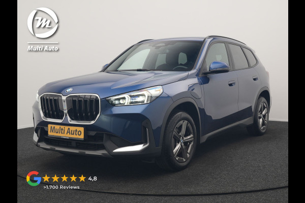 BMW X1 xDrive25e Sportline PHEV 245pk Dealer O.H. | Trekhaak Af Fabriek | Adaptive Cruise | Camera | Harman / Kardon | Lederen Sportstoelen Massage & Memory | Sfeerverlichting | Keyless | Blis | Stoelen & Stuur Verwarmd | Apple Carplay | Plug In Hybrid |