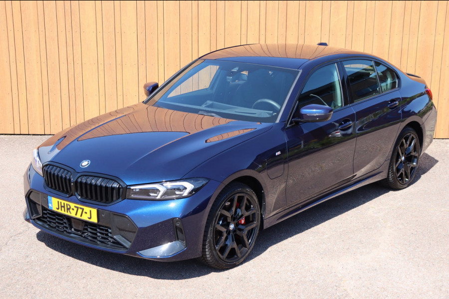 BMW 3-serie 330e xDrive Tansanitblau H.U. ambiance verl M-Sport Pro leer+vw stuurverw el.klep camera's