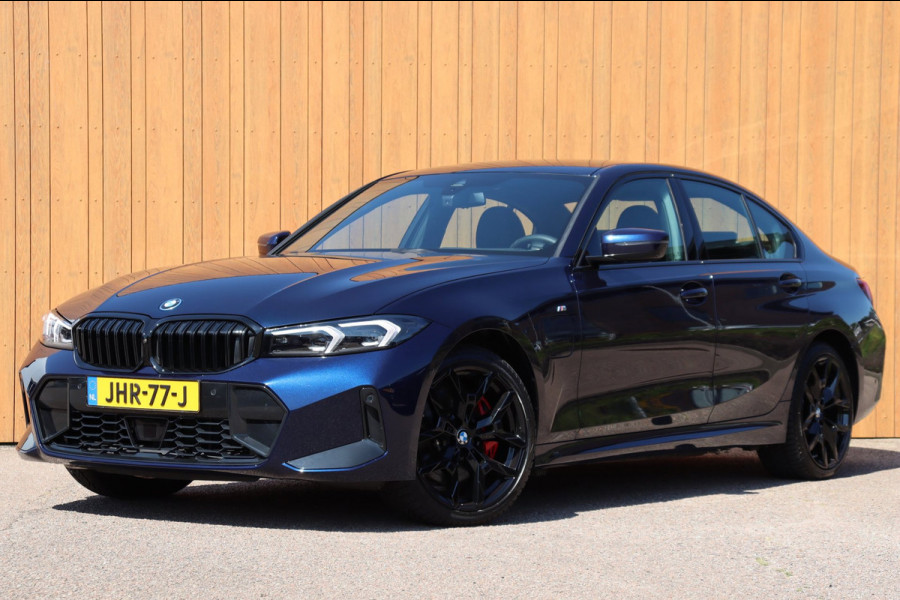 BMW 3-serie 330e xDrive Tansanitblau H.U. ambiance verl M-Sport Pro leer+vw stuurverw el.klep camera's