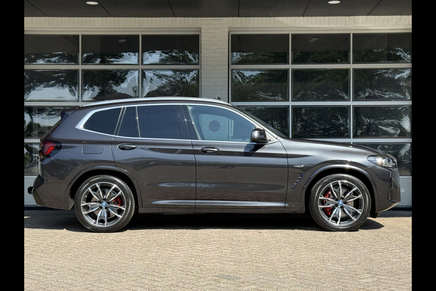 BMW X3 xDrive30e M SPORT | SPORTREMMEN ROOD | PANORAMA | TREKHAAK | ADAPTIEF ONDERSTEL | CAMERA | KEYLESS |