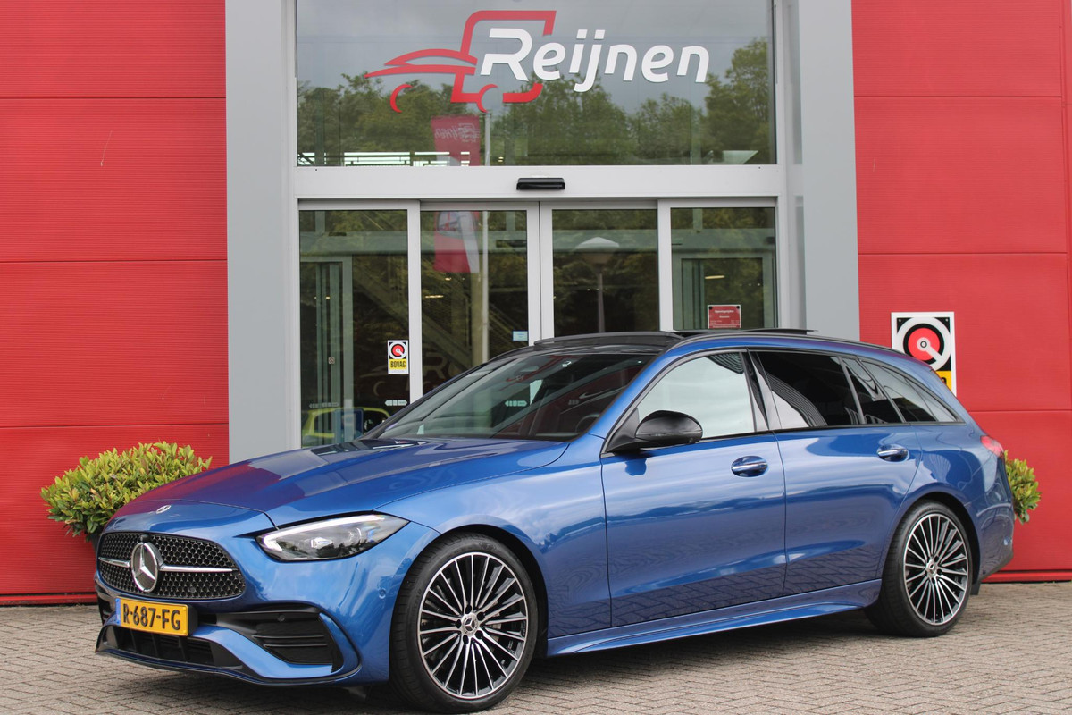 Mercedes-Benz C-Klasse Estate 200 218PK Launch Edition AMG Line | PANORAMISCH SCHUIF/KANTELDAK | LASER KOPLAMPEN | SFEERVERLICHTING | ELEKTRISCH VERSTELBARE VOORSTOELEN MET GEHEUGEN OP BEIDE STOELEN | STOELVERWARMING | ELEKTRISCHE STUURVERSTELLING MET GEHEUGEN | 19'' MULTISPAAKS LICHTMETALEN VELGEN | VERKEERSLICHTEN WEERGAVE | 360° CAMERA | DRAADLOOS APPLECARPLAY/ANDROID AUTO | DRAADLOZE TELEFOONLADER | WIDE SCREEN SCHERM | NIGHT PAKKET | DODEHOEK DETECTIE | EXTRA GETINTE ACHTERSTE RUITEN | PREMIUM AUDIO SYSTEM | ELEKTRISCH BEDIENBARE ACHTERKLEP | KEYLESS ENTRY |