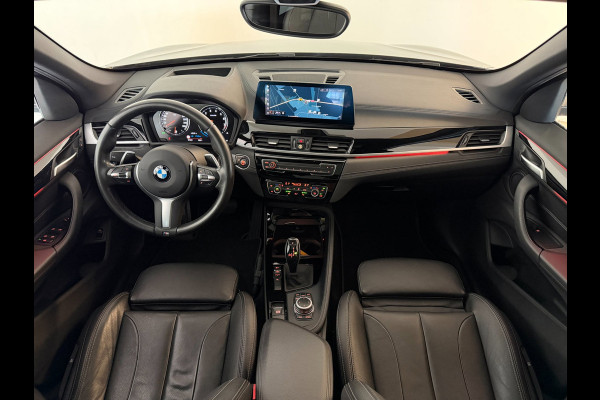 BMW X1 SDrive20i High Executive AIRCO CLIMA NAVI CRUISE PANO LEER STOELVERW HEAD UP TREKHAAK 1800KG CAMERA ELEK KLEP NIEUWSTAAT