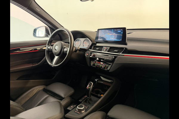 BMW X1 SDrive20i High Executive AIRCO CLIMA NAVI CRUISE PANO LEER STOELVERW HEAD UP TREKHAAK 1800KG CAMERA ELEK KLEP NIEUWSTAAT