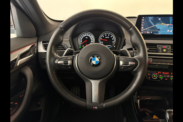 BMW X1 SDrive20i High Executive AIRCO CLIMA NAVI CRUISE PANO LEER STOELVERW HEAD UP TREKHAAK 1800KG CAMERA ELEK KLEP NIEUWSTAAT