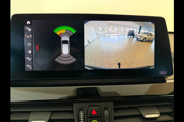 BMW X1 SDrive20i High Executive AIRCO CLIMA NAVI CRUISE PANO LEER STOELVERW HEAD UP TREKHAAK 1800KG CAMERA ELEK KLEP NIEUWSTAAT